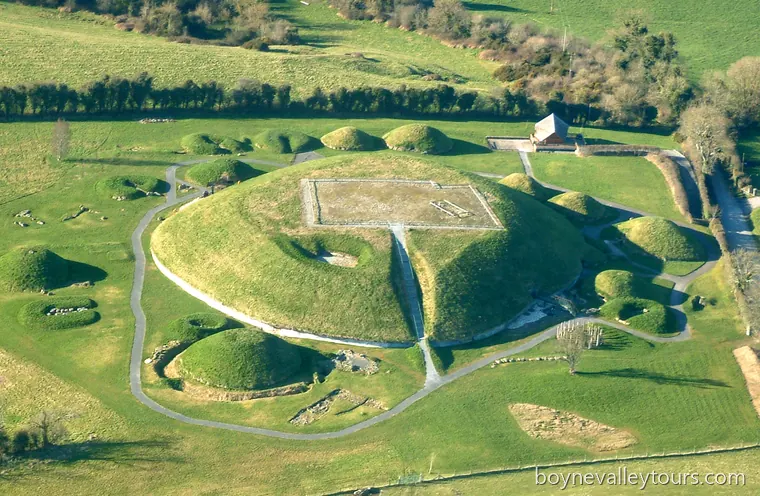 Aerial view of Knowth Great Mound with satellite tombs and paths in the Boyne Valley.