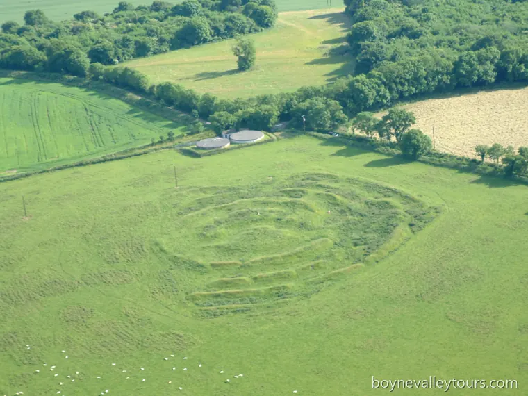 Aerial view of Tlachtga, the Hill of Ward, showing concentric earthwork rings in a green field.